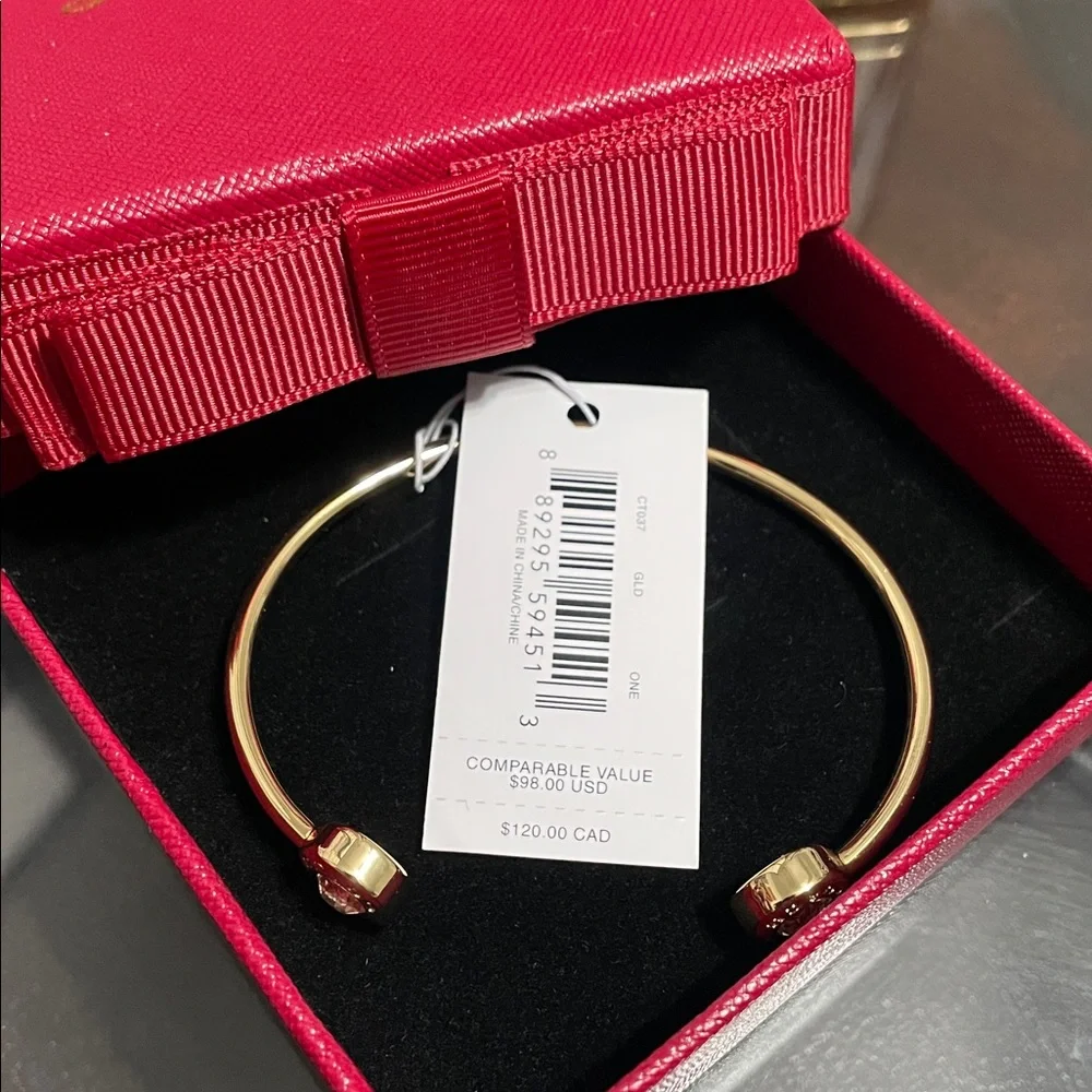 Coach Gold-Tone Open Cuff Bracelet with Crystal Ends